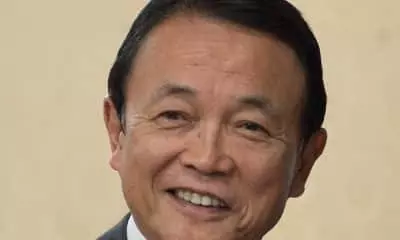 Taro Aso maldição tóquio 2020 coronavírus