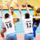 Leal ataca bola contra bloqueio argentino na Liga das Nações de vôlei masculino, a VNL
