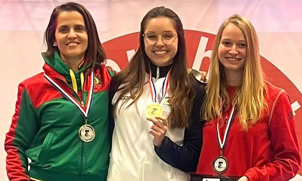 Geovana Meyer no pódio da Intershoot Cup de tiro esportivo e Felipe Wu