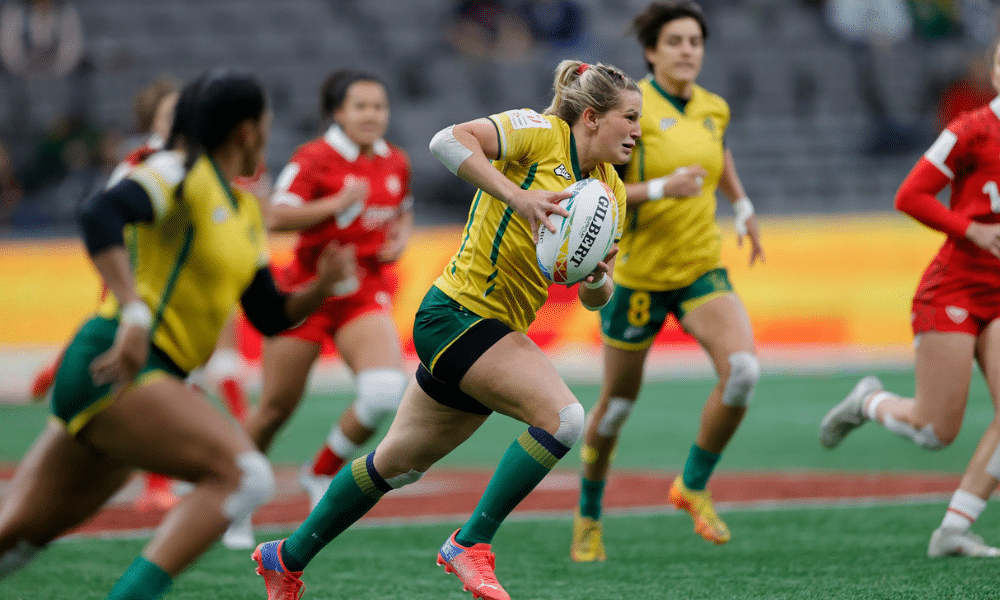 Yaras Hong Kong Sevens Circuito Mundial de rugby enquanto correm