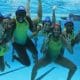 Mas - Mundial Sub-20 de polo aquático. Atletas do Brasil fotografadas no fundo da piscina, enquanto fazem gestos para a câmera