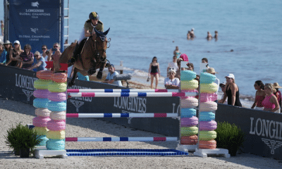 Yuri Mansur monta a sua égua enquanto passa obstáculo do Grand Prix de Miami Beach