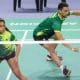 Fabrício Farias e Jaqueline Lima em quadra no Challenge do México de badminton. Ambos vestem shorts pretos e camisetas verdes. Fabrício ataca a peteca com a raquete