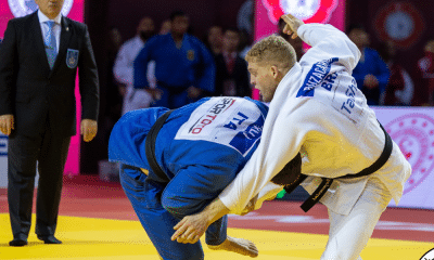 Rafael Buzacarini durante luta no Mundial de judô ao lado de Leonardo Gonçalves