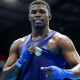 Wanderley Pereira enquanto sorri para foto no Mundial de boxe masculino. Luiz Oliveira perdeu