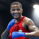 Wanderson Oliveira, o Shuga, sorri para foto após vitória no Mundial de boxe masculino. Yuri Reis perdeu