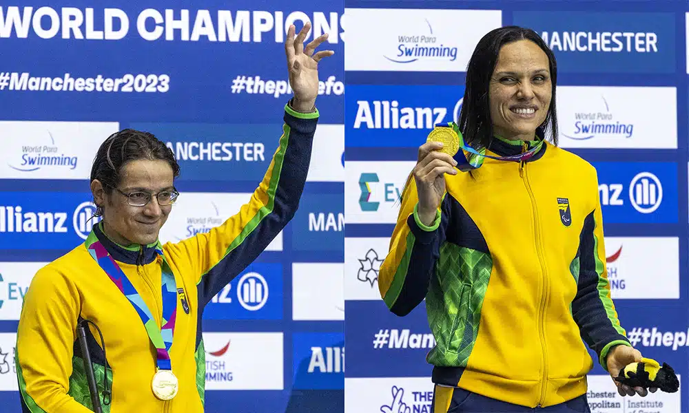 Na imagem, Douglas Matera e Carol Santiago mostrando suas medalhas no pódio.