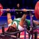 Na imagem, Tayana Medeiros, que contribuiu com a medalha de prata do Brasil, levantando peso na sua prova.