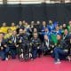 Delegação do Brasil reunida para comemorar os resultados na Copa Tango (Divulgação/CBTM)