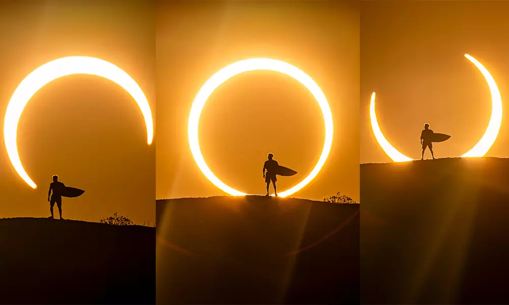 Na imagem, Ítalo Ferreira com sua prancha diante do eclipse solar.