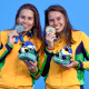 Beatriz Carneiro e Débora Carneiro com medalhas do Parapan