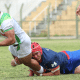 Jogador dos Tupis, atleta do Brasil de rúgbi XV, sofrendo tackle com a bola na mão na La Vila Internacional Rugby Cup