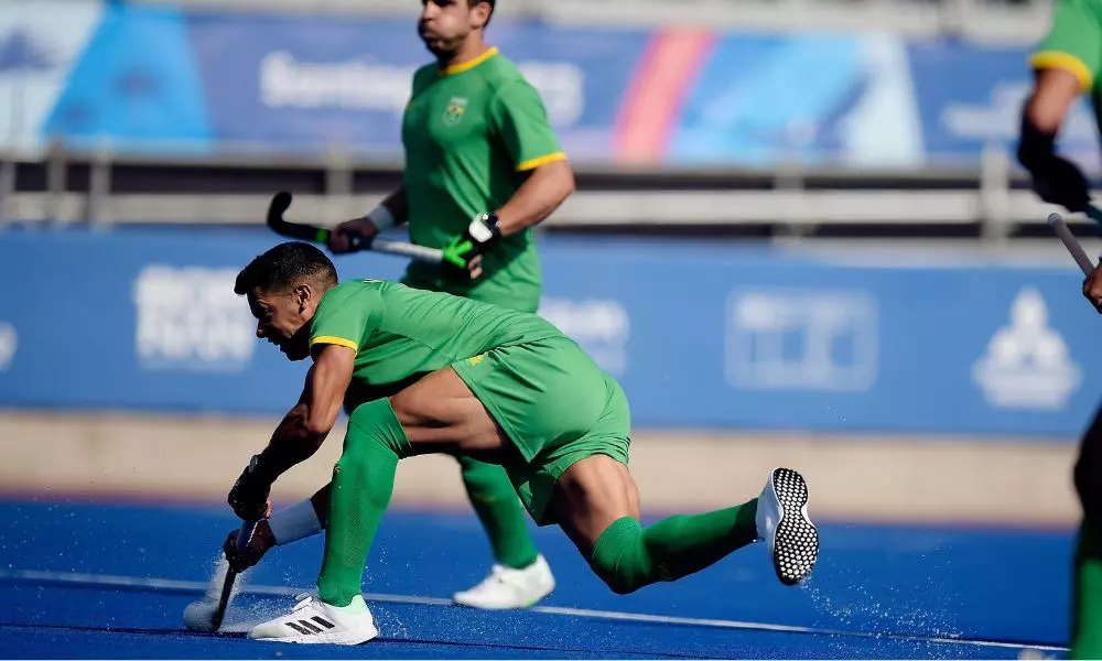 Brasil em ação no torneio masculino de hóquei sobre no Pan de Santiago (Alexandre Loureiro/COB)
