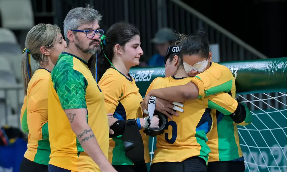 Jogadoras emocionadas após o apito final da medalha de bronze