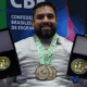 Jovane Guissone com medalhas do Campeonato Brasileiro de esgrima em cadeira de rodas