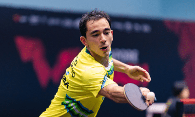 Hugo Calderano em ação no WTT Champions de Incheon de tênis de mesa; junto com Bruna Takahashi
