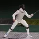 Guilherme Toldo em ação durante duelo na Copa do Mundo de Hong Kong de florete, paris-2024, esgrima Etapa de Túnis da Copa do Mundo de florete