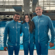 Isaac Souza, Ingrid Oliveira e Alexandre Ferrer posam para foto com uma plataforma de saltos ornamentais ao fundo
