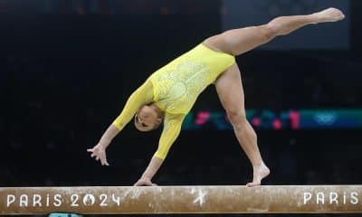 Uma das lindas imagens que Flávia Saraiva protagonizou ao competir na trave.