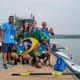 Na imagem, time do PR3 Quatro com misto do Brasil mostrando a nova medalha.