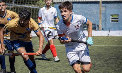 Jogador do Floripa contra o do AABB Canoas no Brasileiro de Hóquei sobre a grama