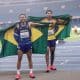 Ricardo Mendonça e Christian Gabriel comemoram a dobradinha do Brasil nos 100 m T37 do Mundial de atletismo paralímpico