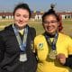 Na imagem, Graziela dos Santos (de amarelo), com Ana Clara Machado, com medalhas de ouro e prata, respectivamente.